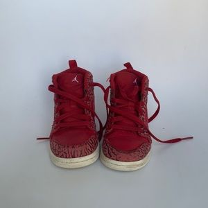 Nike / Michael Jordan kids high top sneakers.